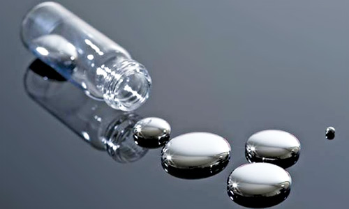 elemental mercury droplets from a bottle / vial