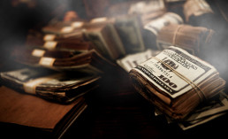 dirty money rolls hundred dollar bills