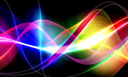 The Best Advice So Far: Influence - multi-colored light waves on a black background