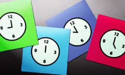 brightly colored paper clocks