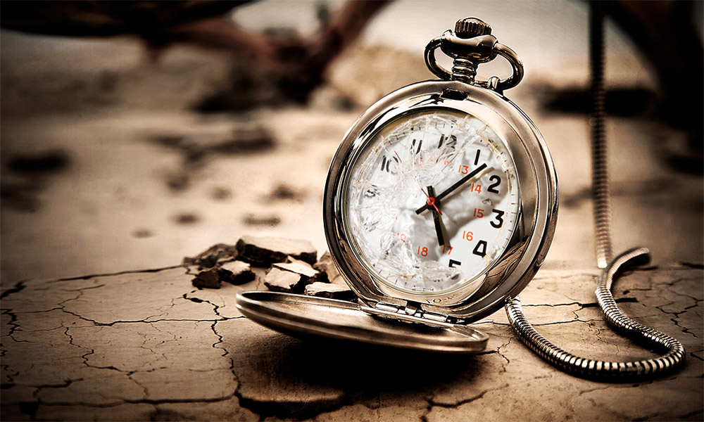 the umpteenth time - The Best Advice So Far - broken pocket watch on cracked earth