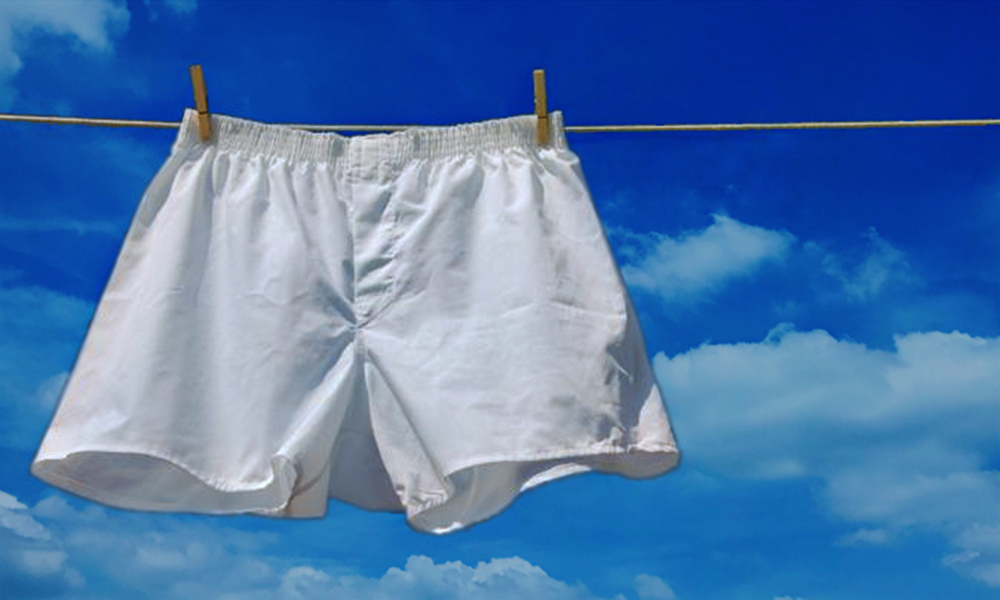 white cotton briefs/underwear hanging on a clothes line